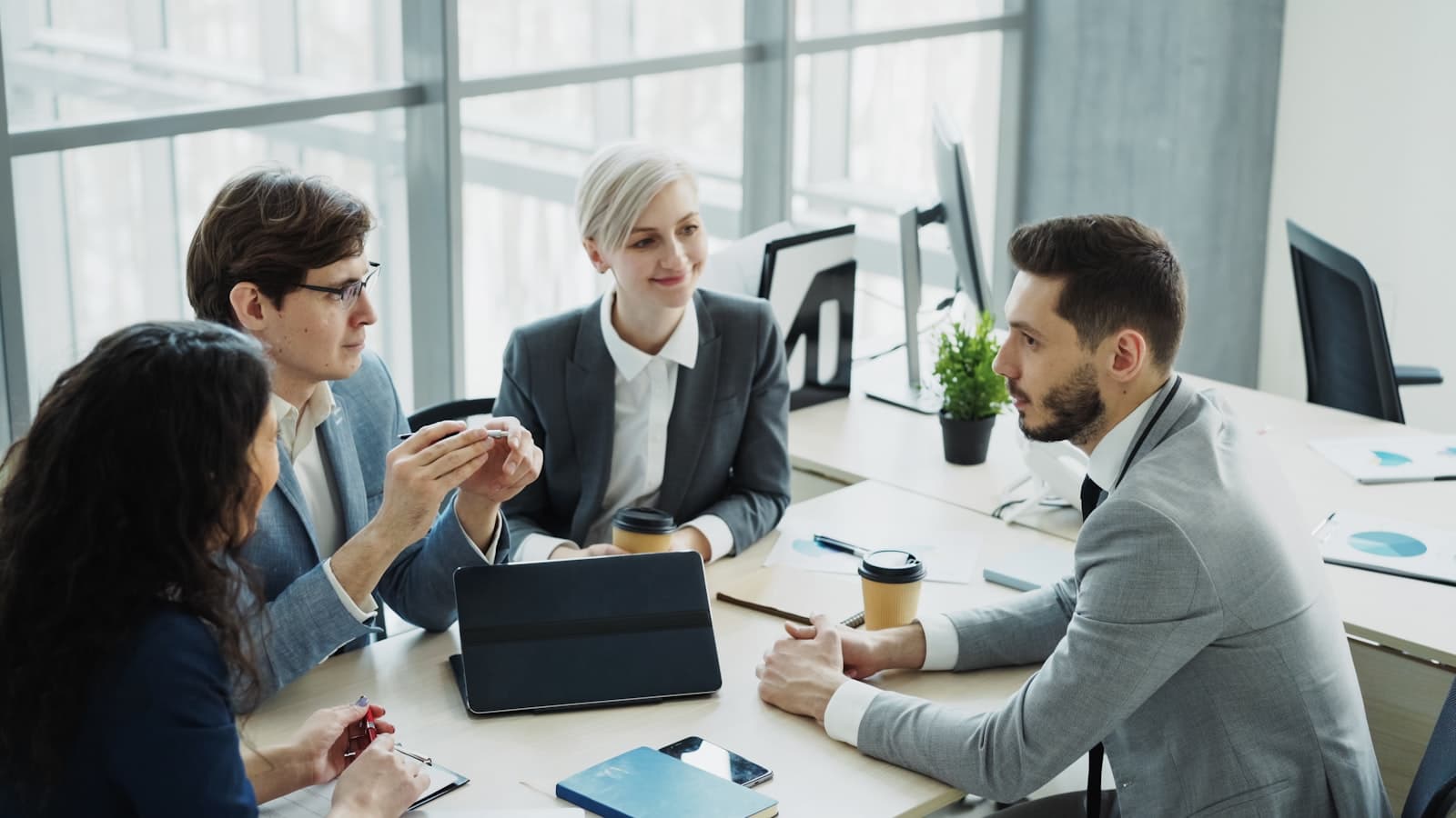 The Vaultra team reviewing a client's cash flow together